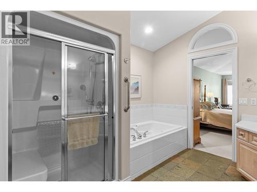 Shower and bathtub ensuite. - 4400 Gallaghers Drive E Unit# 2, Kelowna, BC - Indoor Photo Showing Bathroom
