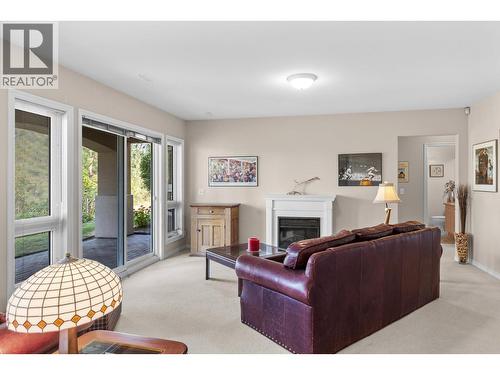 4400 Gallaghers Drive E Unit# 2, Kelowna, BC - Indoor Photo Showing Living Room With Fireplace