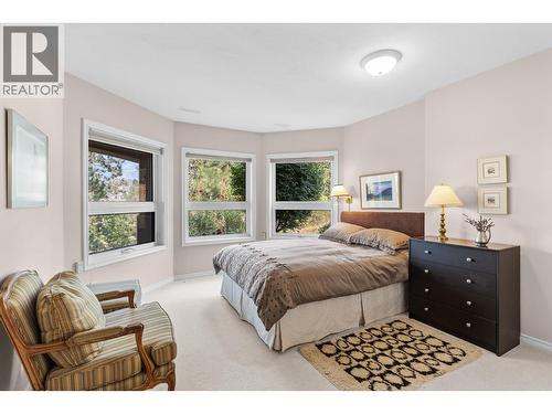 Bright downstairs bedroom. - 4400 Gallaghers Drive E Unit# 2, Kelowna, BC - Indoor Photo Showing Bedroom