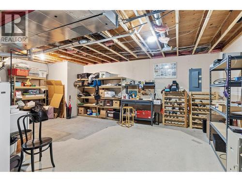 Expansive downstairs storage space. - 4400 Gallaghers Drive E Unit# 2, Kelowna, BC - Indoor Photo Showing Basement