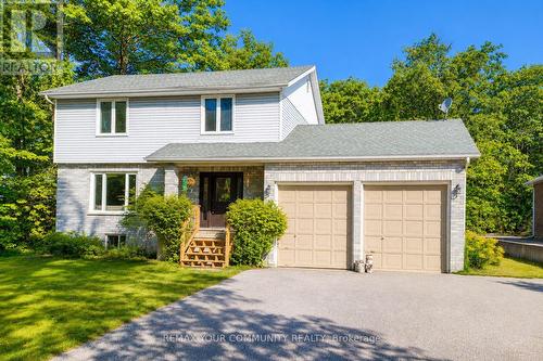 1138 Siesta Drive, Tiny, ON - Outdoor With Facade