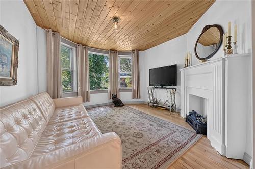 587 Ashburn St, Winnipeg, MB - Indoor Photo Showing Other Room With Fireplace