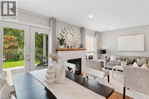 711 Angler Way, Waterloo, ON - Indoor Photo Showing Living Room With Fireplace