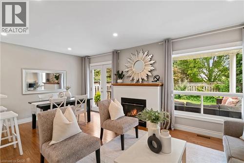 711 Angler Way, Waterloo, ON - Indoor Photo Showing Living Room With Fireplace