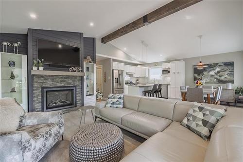 437 Temple Ave, Winnipeg Beach, MB - Indoor Photo Showing Living Room With Fireplace