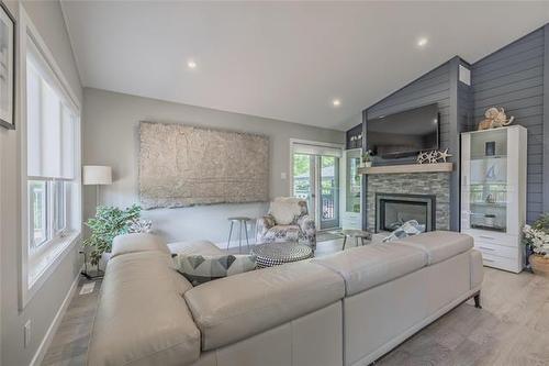 437 Temple Ave, Winnipeg Beach, MB - Indoor Photo Showing Living Room With Fireplace