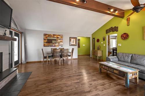 13 Lions Way, Stonewall, MB - Indoor Photo Showing Living Room With Fireplace
