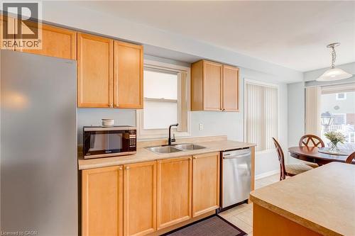 672 Mceastern Path, Milton, ON - Indoor Photo Showing Kitchen With Double Sink