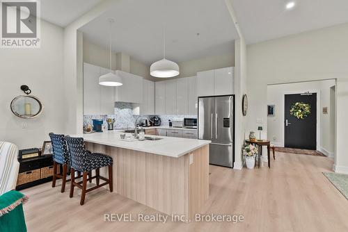 404 - 77 Yates Street, St. Catharines (Downtown), ON - Indoor Photo Showing Kitchen With Double Sink