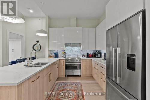 404 - 77 Yates Street, St. Catharines (Downtown), ON - Indoor Photo Showing Kitchen With Double Sink With Upgraded Kitchen