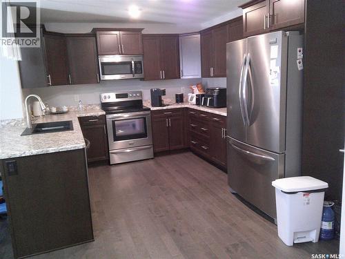 224 3630 Haughton Road E, Regina, SK - Indoor Photo Showing Kitchen With Stainless Steel Kitchen With Double Sink