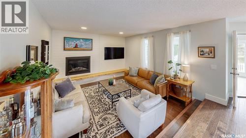 7551 Butler Bay, Regina, SK - Indoor Photo Showing Living Room With Fireplace