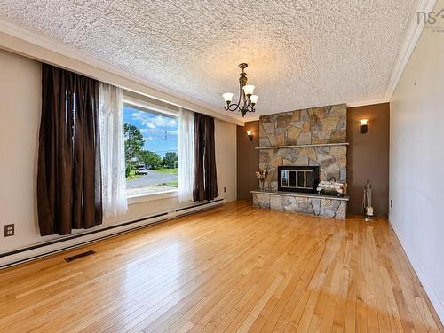 26 Beechwood Drive, Glace Bay, NS - Indoor Photo Showing Living Room With Fireplace