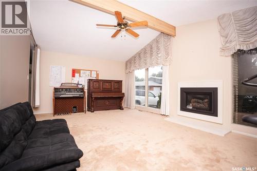 145 Mayfair Crescent, Regina, SK - Indoor Photo Showing Living Room With Fireplace