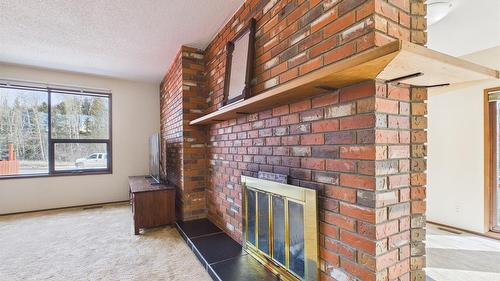 419 Lindsay Street, Kimberley, BC - Indoor With Fireplace