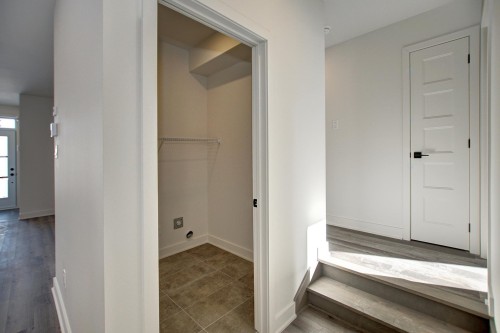 Salle de lavage - 3179B Rue Roger, Sainte-Marthe-Sur-Le-Lac, QC - Indoor Photo Showing Other Room