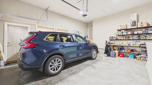 240 Boulder Creek, Cranbrook, BC - Indoor Photo Showing Garage