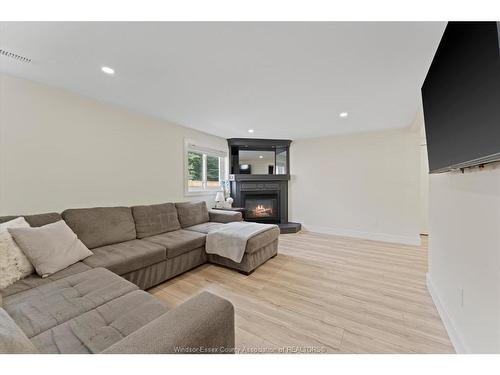 414 St Louis, Belle River, ON - Indoor Photo Showing Living Room With Fireplace