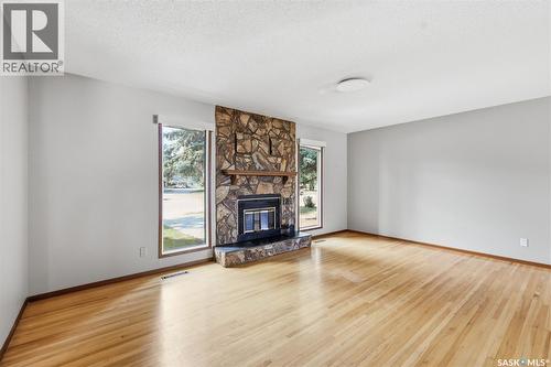 2509 Taylor Street E, Saskatoon, SK - Indoor Photo Showing Living Room With Fireplace