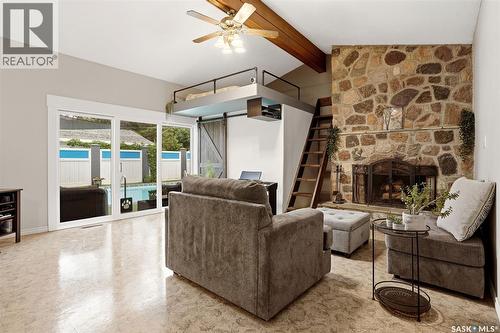 2705 Grant Road, Regina, SK - Indoor Photo Showing Living Room With Fireplace