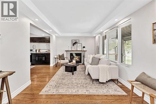 1362 Elsmere, Windsor, ON - Indoor Photo Showing Living Room With Fireplace
