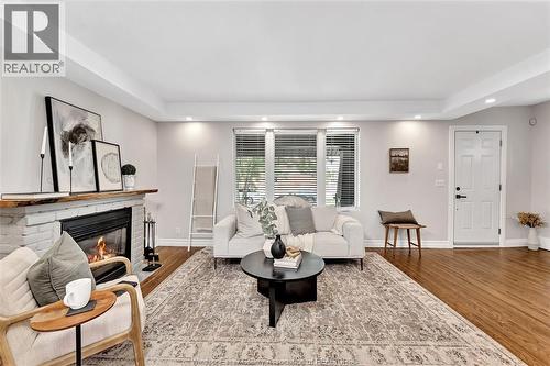 1362 Elsmere, Windsor, ON - Indoor Photo Showing Living Room With Fireplace