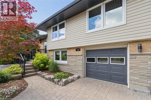 Attached garage and interlock driveway - 138 Blueridge Avenue, Kitchener, ON 