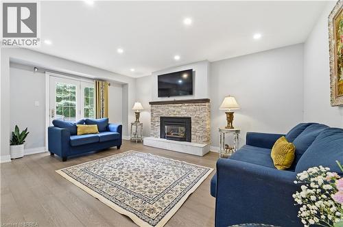 512 Hawthorne Crescent, Milton, ON - Indoor Photo Showing Living Room With Fireplace