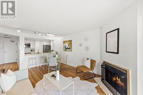 1003 - 725 King Street W, Toronto, ON - Indoor Photo Showing Living Room With Fireplace