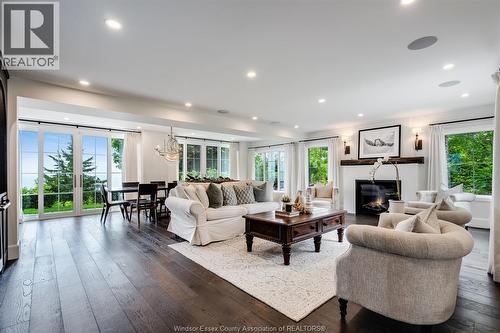 24 Bayshore, Leamington, ON - Indoor Photo Showing Living Room With Fireplace