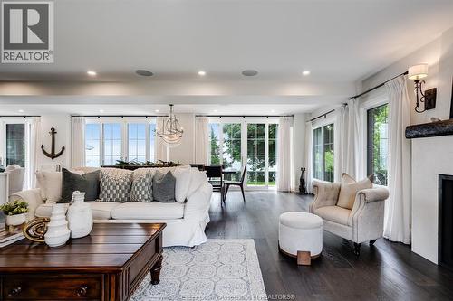 24 Bayshore, Leamington, ON - Indoor Photo Showing Living Room With Fireplace