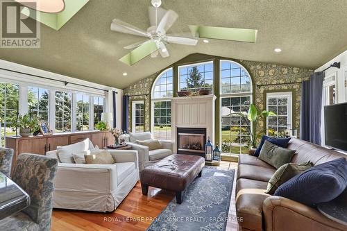3335 Four Seasons Drive, Frontenac (Frontenac South), ON - Indoor Photo Showing Living Room With Fireplace