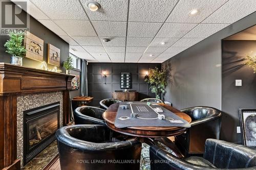 3335 Four Seasons Drive, Frontenac (Frontenac South), ON - Indoor Photo Showing Other Room With Fireplace