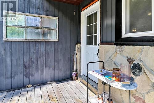 side entrance off kitchen to deck - 7363 Sideroad 33 34 Road, Clearview, ON - Outdoor With Exterior