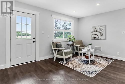 Front door to porch - 7363 Sideroad 33 34 Road, Clearview, ON - Indoor Photo Showing Living Room