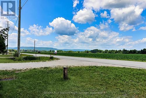 Views of Blue Mountain from porch at front house - 7363 Sideroad 33 34 Road, Clearview, ON - Outdoor With View