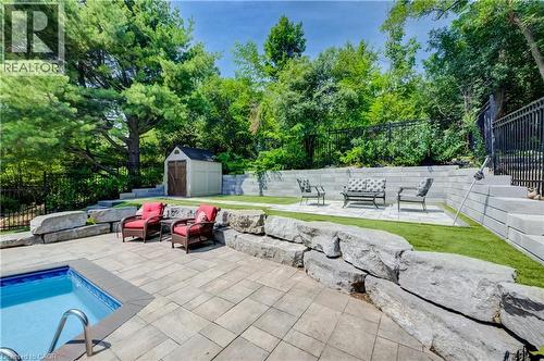 7664 Maltby Road E, Puslinch, ON - Outdoor With In Ground Pool