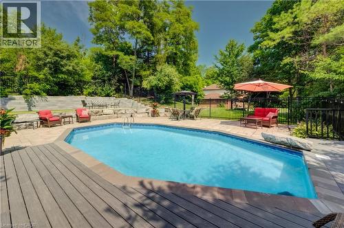 7664 Maltby Road E, Puslinch, ON - Outdoor With In Ground Pool With Deck Patio Veranda With Backyard