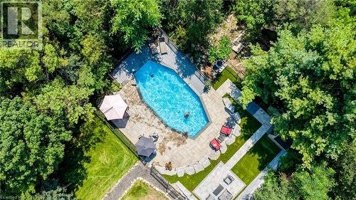 7664 Maltby Road E, Puslinch, ON - Outdoor With In Ground Pool