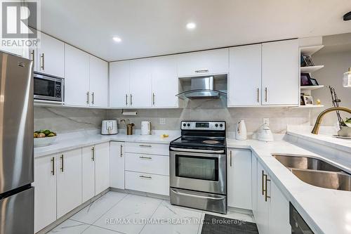 208 - 238 Albion Road, Toronto, ON - Indoor Photo Showing Kitchen With Double Sink