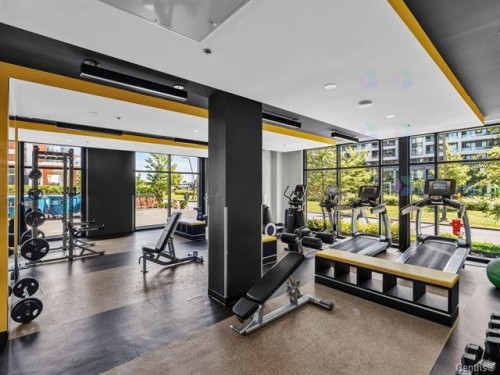 Salle d'exercice - 205-700 Rue Des Éclaircies, Brossard, QC - Indoor Photo Showing Gym Room