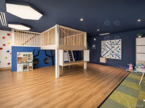 Salle de jeux - 205-700 Rue Des Éclaircies, Brossard, QC - Indoor Photo Showing Other Room