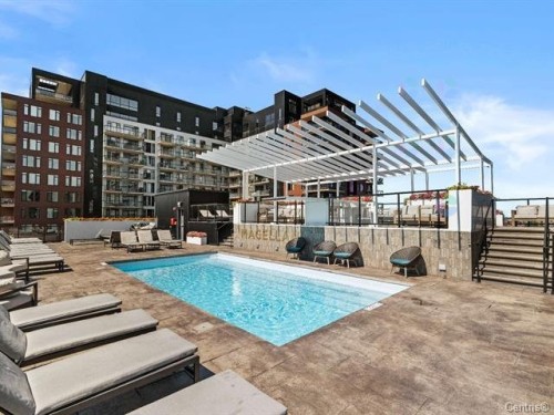 Piscine - 205-700 Rue Des Éclaircies, Brossard, QC - Outdoor With In Ground Pool