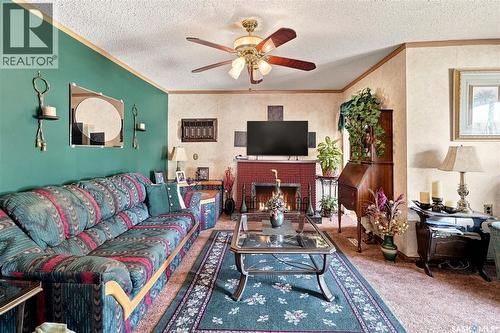 1229 Willow Avenue, Moose Jaw, SK - Indoor Photo Showing Living Room With Fireplace