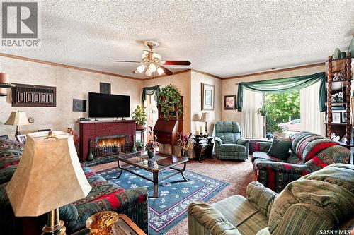 1229 Willow Avenue, Moose Jaw, SK - Indoor Photo Showing Living Room With Fireplace