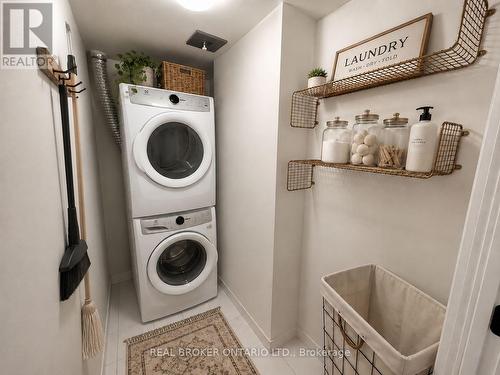 608 - 50 George Butchart Drive, Toronto, ON - Indoor Photo Showing Laundry Room