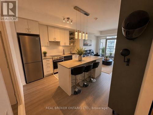608 - 50 George Butchart Drive, Toronto, ON - Indoor Photo Showing Kitchen