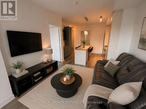 608 - 50 George Butchart Drive, Toronto, ON - Indoor Photo Showing Living Room