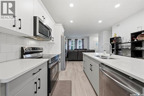 132 Rosewood Boulevard E, Saskatoon, SK - Indoor Photo Showing Kitchen With Double Sink