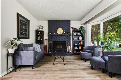 3472 Eldridge Avenue, Winnipeg, MB - Indoor Photo Showing Living Room With Fireplace
